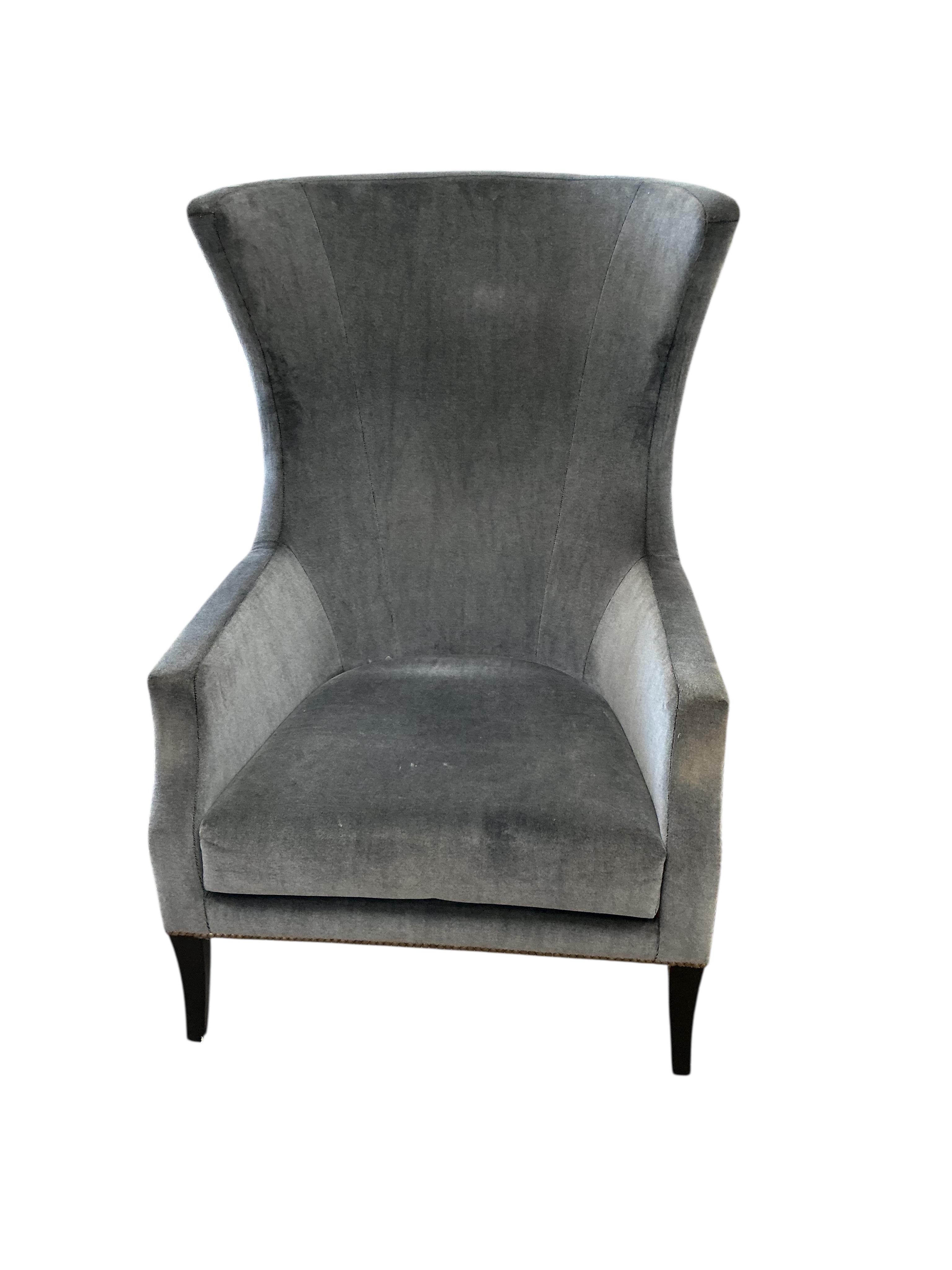 A Contemporary upholstered armchair, width 70cm, depth 72cm, height 110cm